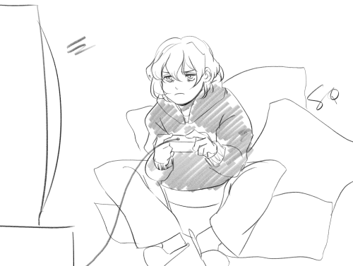 A rough sketch depicting a simplified Soma Cruz from the Castlevania series. He's lurched forward, with a disgruntled focused expression. He's holding a game controller in his hands. He's seated on many pillows on the floor. He's wearing slippers.