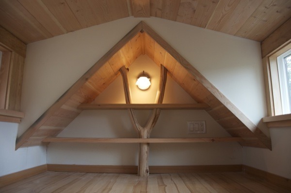 riddick09:  The Acorn tiny house is 14′ by 8.5′ with a covered front porch and