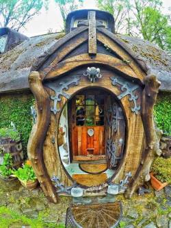 voiceofnature:  Whimsical hobbit house built by Stuart Grant. Located near Tomich, Scotland, he constructed his own real-life Hobbit house with a magical-looking outside and impressive interior. Built in the 1980s, the exterior of the home is completely