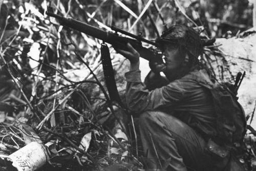 historicaltimes: US Marine Sniper in Guadalcanal, November 1942. via reddit 