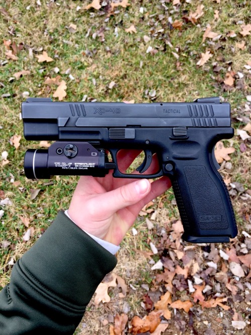 lookatmyguns:  Not the nicest of all the guns I usually see on here but she’s my baby ( Springfield XD 40S&W Tactical 5") Source: http://imgur.com/ffygfpj