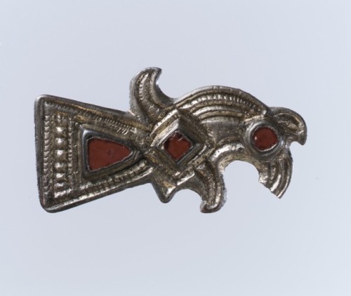 Bird-Shaped Brooch via Medieval ArtMedium: Silver-gilt, garnets with patterned foil backings; iron s