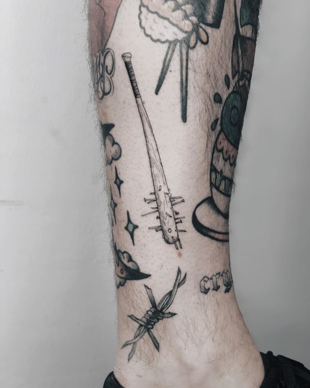 Bat with barbed wire Lucille bat by Blake Ohrt MADISON TattooNOW