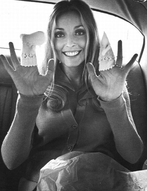 luciferlaughs:Photos of pregnant actress Sharon Tate shortly before she was murdered by members of the Manson Family in her own home. Just two weeks before she was due, they had tied a long rope around her neck and stabbed her a total of 16 times.