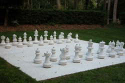 art-in-context:  Yoko Ono, White Chess Set, 1966  photo via  In this piece Yoko Ono recreates a chess set with all pieces and squares painted white. A brass plaque underneath the piece read “Chess set for playing as long as you can remember where all