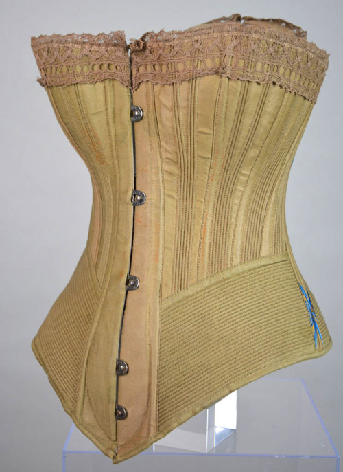 c1890. Busk front corset made from cotton twill lined in fawn coutil and interlined with hessian. Th