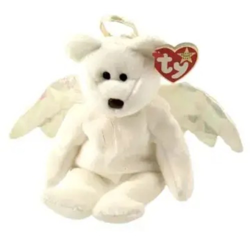 a stark white bear plush with golden fabric wings and a matching halo attached to the head by thread.
