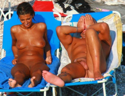 mixedgendernudity:  Shaved nudists have a great time at the beach!