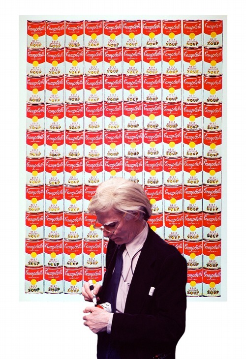  Andy Warhol in front of 100 Cans 1962 