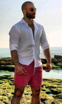 Just wondering what&rsquo;s under the shirt and shorts - looks like one handsome, very hair sexy man - WOOF