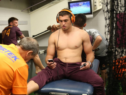Losing himself in his Coach’s voice as one of the assistants rubs him down.