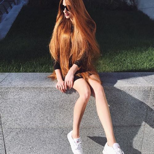 Anastasiya Sidorova, russian model with long flaming red hair known as Red Rapunzel.source: @sidorov