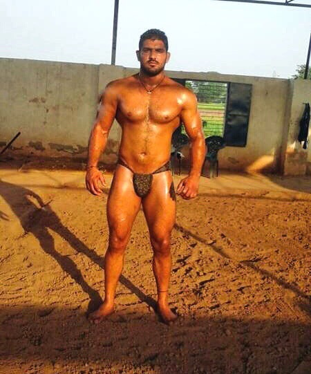 Oiled up Indian mud wrestler from Bilari. I would let him throw me around in bed and rape my boy ass