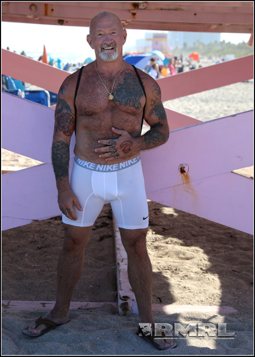 realmenreallife:  It was so fun watching Scott at Haulover. He’d never been, and it was great fun seeing him show off and receive an incredible amount of attention. At the lifeguard station I found some shade from the sun, and enjoyed contrasting his