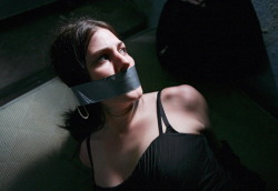 cutegirlsintrouble:  Wraparound tape gag. Love it.