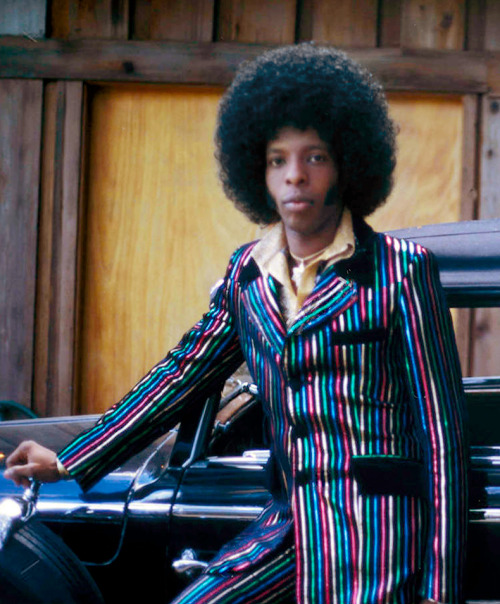 glamidols:Sly Stone wearing a striped suit by Granny Takes A Trip Circa 1975