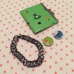 tinycommunist:  tiny giveaway time :•)includes:-mini totoro coin purse &amp; figurine-black choker-butterfly pin and gnome pin-2 handmade dream people to keep under ur pillow-3 hair bows-stickers!! (not pictured) i will make you whatever stickers you