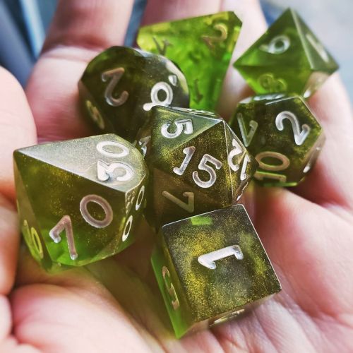 The lovely Goblin Horde, by @luckyhanddice[Image description: A swampy, translucent green, sharp-e