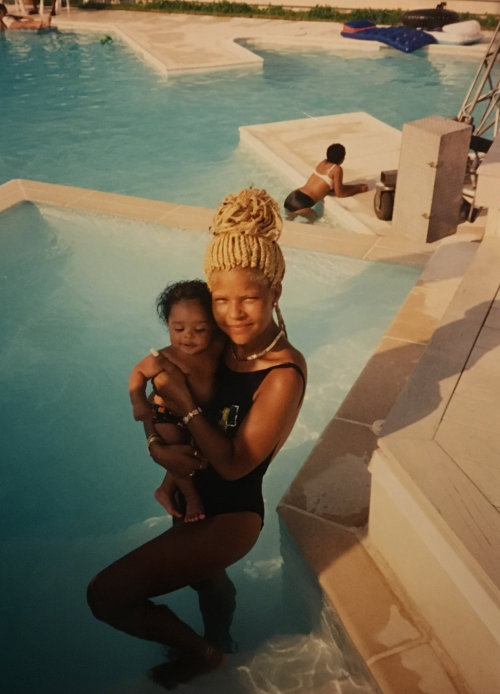 unknownwonderful:  elsworth-thundermonkey:  theeducatedfieldnegro:  NYTimes: Misa Hylton and her infant son with  Justin  Combs, on the set of the  Notorious B.I.G.’s “Juicy” video.  Hylton, who was dating Sean Combs when he founded Bad Boy Records