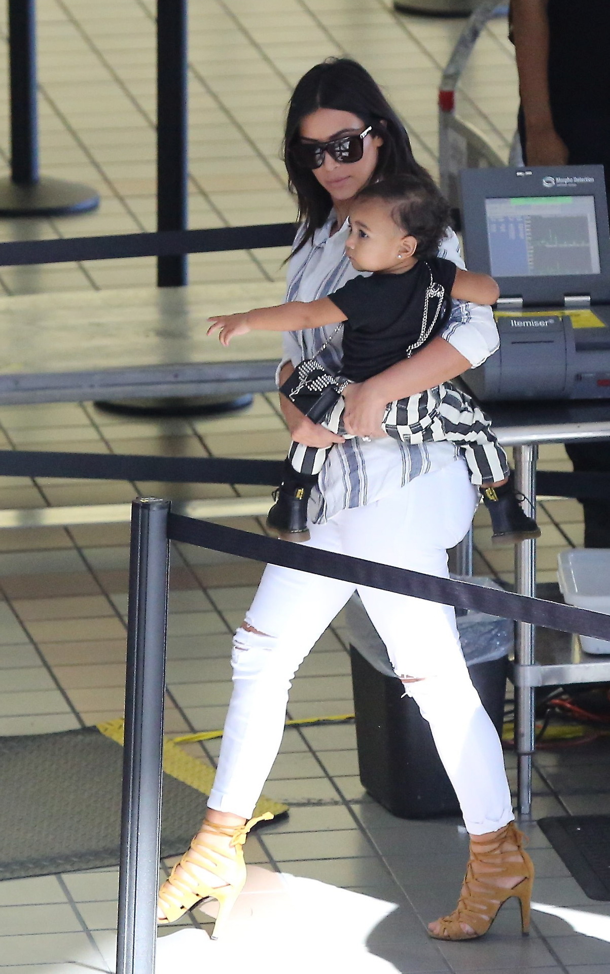 kimkanyekimye:  Kim &amp; North at LAX airport in Los Angeles 9/1/14  😍