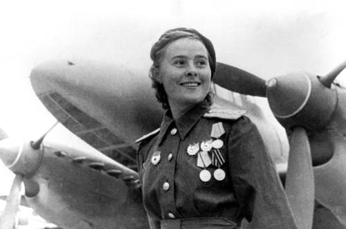 ofskfe: historicaltimes: WWII — Soviet fighter pilot Lydia Litvyak and a Petlyakov Pe-2. She p