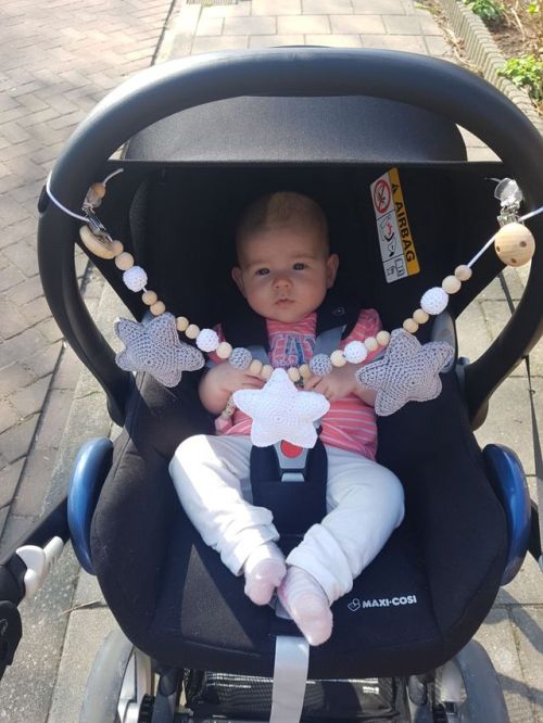 Year of yarn - April 4th - childrenLook at my adorable niece with the stroller chain I made her.This