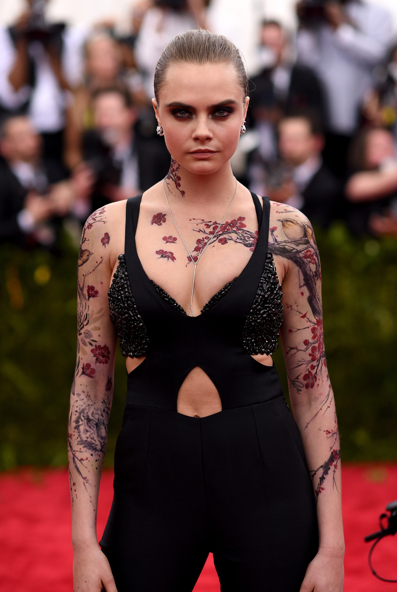 teenvogue:  Cara Delevingne debuted the high-fashion version of temporary tats last