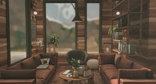 The Otterhouse A Quaint Coffee Shop, Right On The Road. With Big Modern Windows And A Rustic Interior,