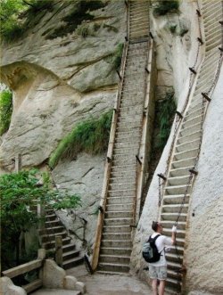 coolthingoftheday:    The steepest stairs in the world: the Mt. Huashan Hiking Trail. Huashan is one of China’s five sacred mountains, and one of the country’s most popular tourist attractions.  