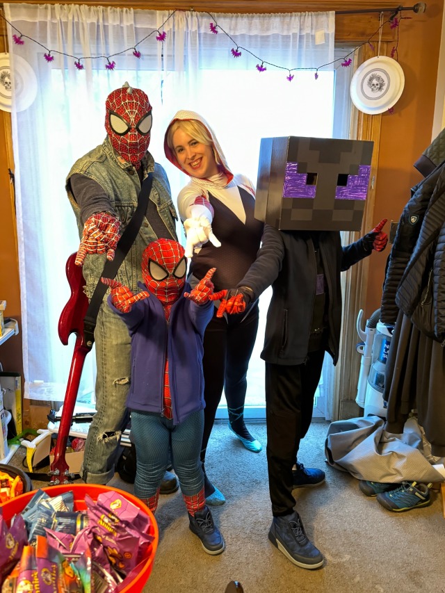 Just realized I hadn't yet posted any photos of my family in our Halloween costumes. We did a Spider-Verse thing: my partner 