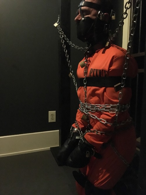 seabondagesadist:  The prisoner came to visit for some heavy bondage and captivity. After processing he found himself in orange, tape gagged, muzzled, shackled, mittens, chained and strapped in heavy bondage for several hours… 