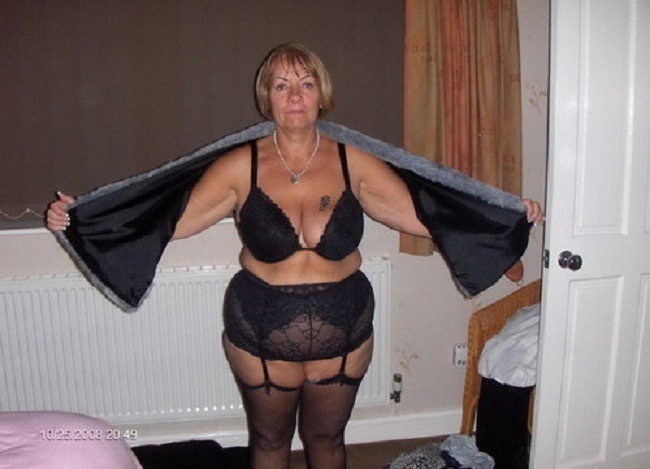 This fat granny looks absolutely ravishing in her black lingerie! She would make
