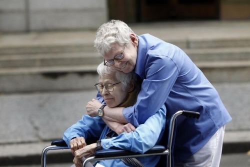 uglyemo:Connie Kopelov and Phyllis Siegel embrace after becoming the first gay couple married in Man