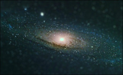 just&ndash;space: Creator: This has been a Long Term Goal of mine, probably three years in the making. I finally managed to collect my own astrophoto of The Andromeda Galaxy  and tilt-shift it. You know, for fun&quot;source js 