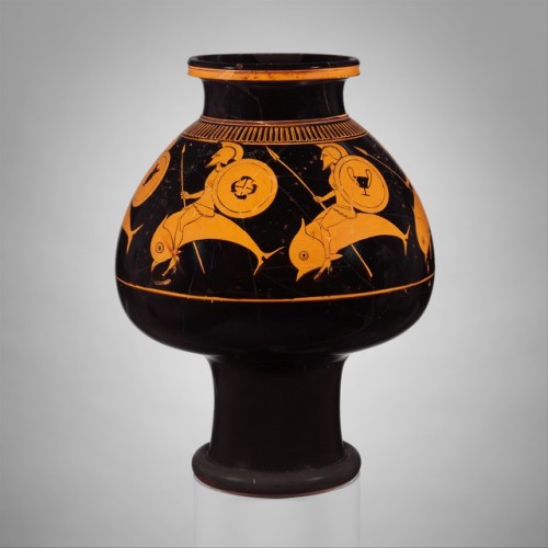 Terracotta red-figure psykter (vase for cooling wine) depicting hoplites riding dolphins.  Attribute
