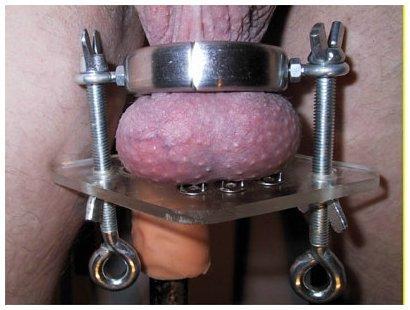 malegenitalmodsgalore: malegenitalmodsgaloreBDSM / CBT. His balls in a rather unusual press / crushe
