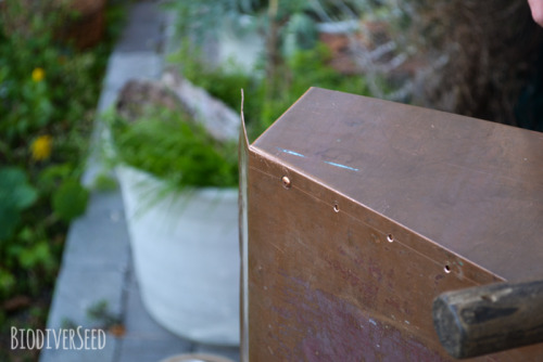 biodiverseed:Top Bar Beehive: Now with a Roof!We started out with a salvaged piece of copper, and to