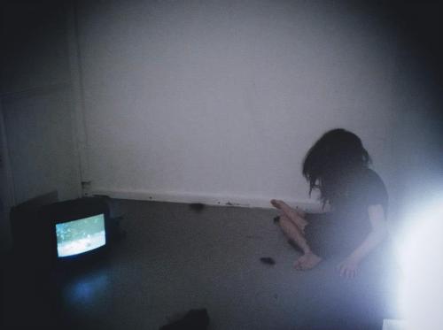 raveneuse:  me sitting in my exhibition space before my first performance at the private viewing.  