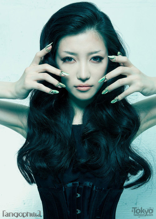 Japanese model Machiko wearing silver finger tips by the Japanese custom molded body jewelry brand F
