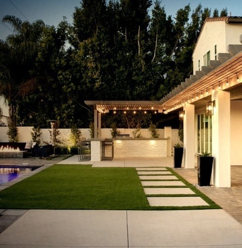 Concrete Pavers - LandscapeInspiration For A Mid-sized Contemporary Full Sun Backyard Concrete Paver