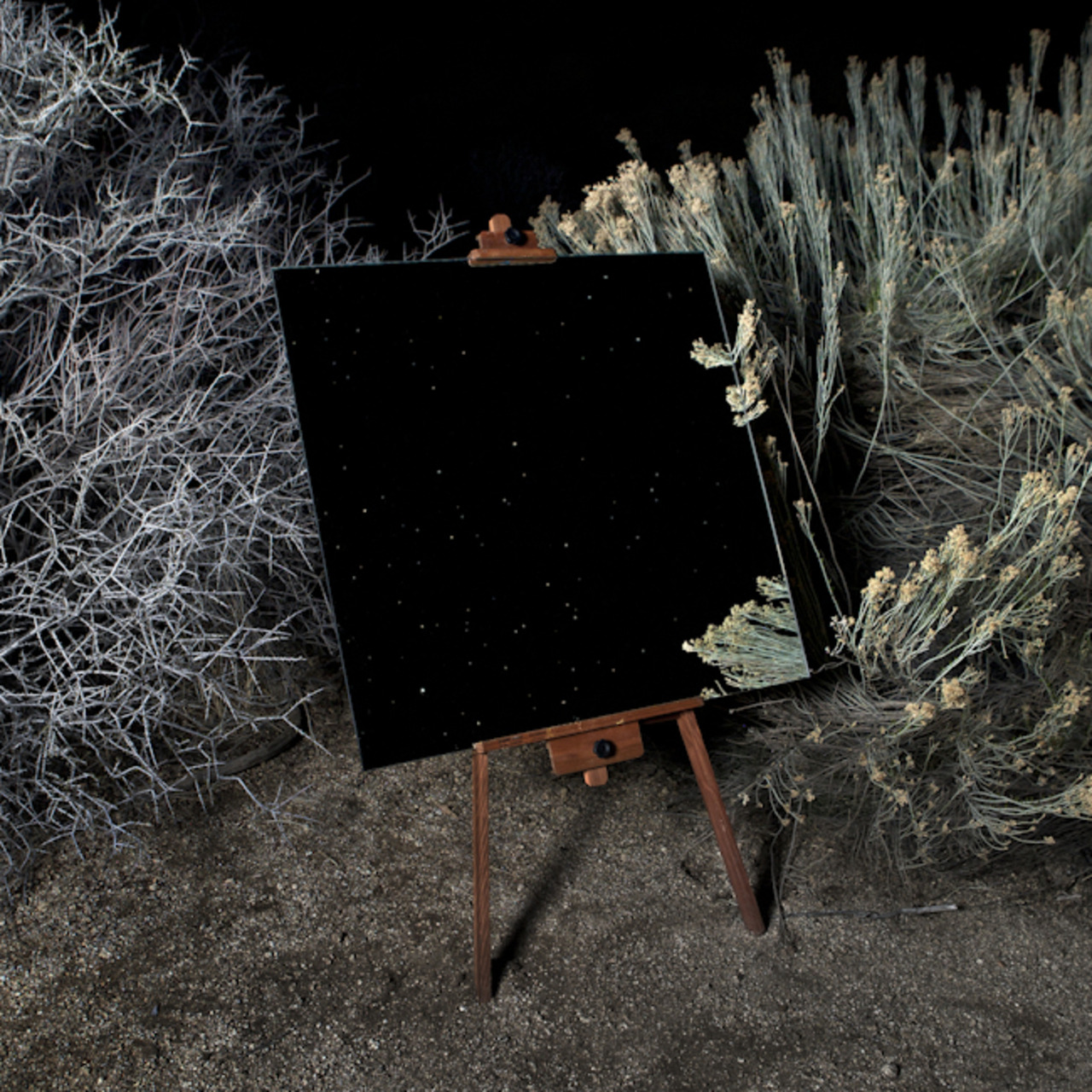 asylum-art:Photographs of Mirrors on Easels that Look Like Paintings in the Desert