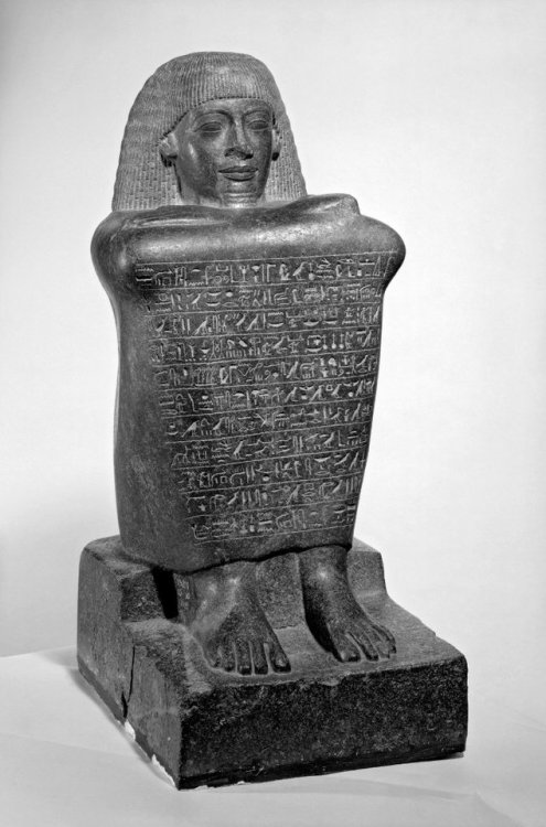 Block-statue of Amenhotep, son of HapuGranodiorite block-statue of Amenhotep, son of Hapu; eleven ro