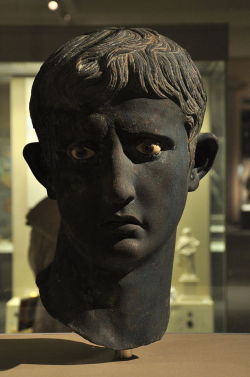 historyarchaeologyartefacts:The Meroe Head: the head of a statue of Augustus from Egypt that was stolen by raiding Nubians. It was buried under a Nubian shrine as a symbolic humiliation [608 x 1024]