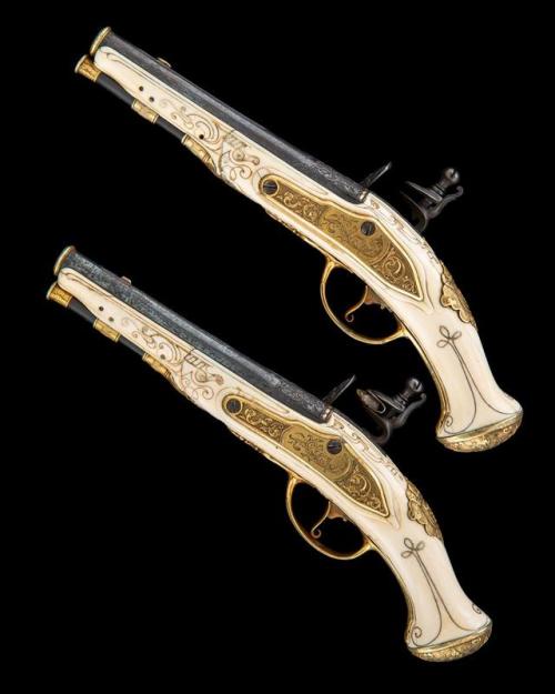 A pair of ivory stocked, gilt flintlock pistols made for King Louis XVI circa 1770.from Holt’s Aucti