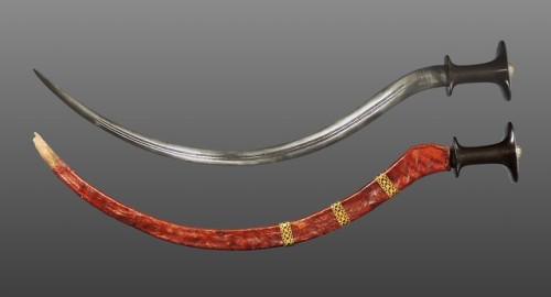 Shotel and sheath, 94cm long.The shotel is a traditional Ethiopian sword, with a curved, double-edge