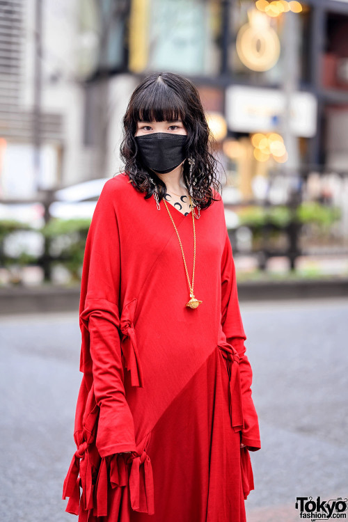 Japanese artist Miyu on the street in Harajuku wearing a ribbon dress by Japanese fashion brand LIMI