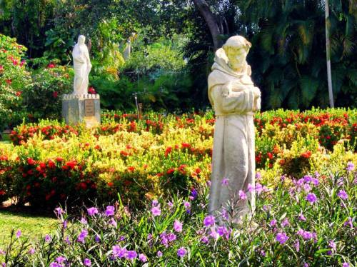 Holy Photobomb. #statues #saints #garden #church #monastery #ancientspanishmonastery #flowers #vacat