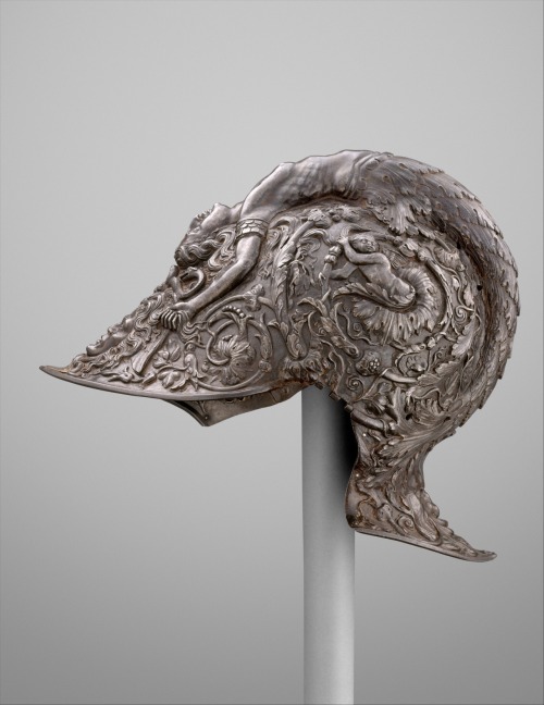 Burgonet: A mermaidlike siren forming the helmet’s comb holds a grimacing head of Medusa by the hair