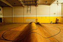 destroyed-and-abandoned:  Bizarre Gym Floor Warped by the Elements; Tough Shot by Holubow Source: eholubow (flickr) 