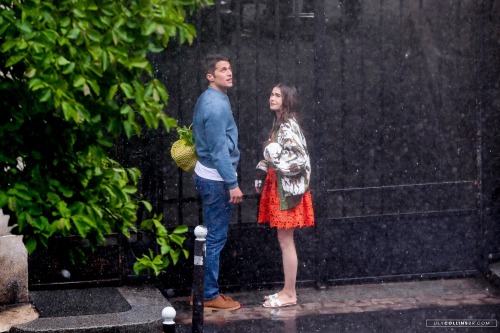 Lily Collins and Lucas Bravo were filming under fake rain Emily In Paris, in Paris today, May 1